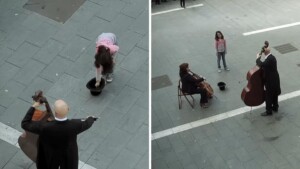 Questa bambina lancia una moneta a un musicista di strada e ciò che accade dopo ti lascerà senza parole!